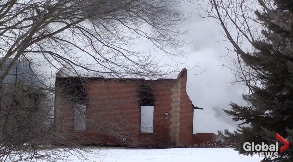 Firefighters battled a house fire north of Brighton early Friday. OPP say one person died in the blaze.