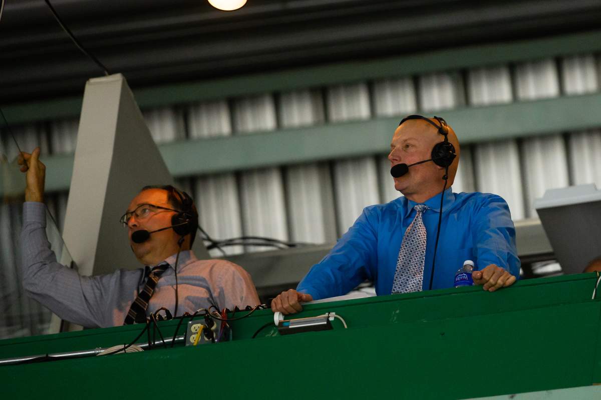 Cam Moon, right, calls a game for the Red Deer Rebels. 