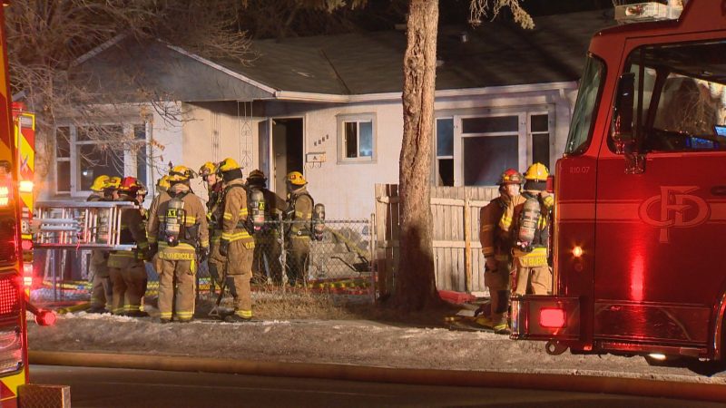 Calgary firefighters respond to a house fire on Centre Street and 35 Avenue Northeast on Tuesday, Jan. 19, 2021. 