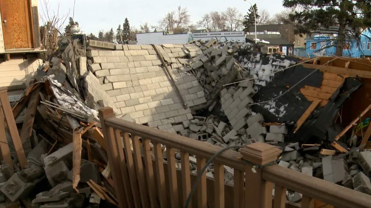 A cinder block wall was knocked down in the windstorm in Calgary on Jan. 13, 2021.