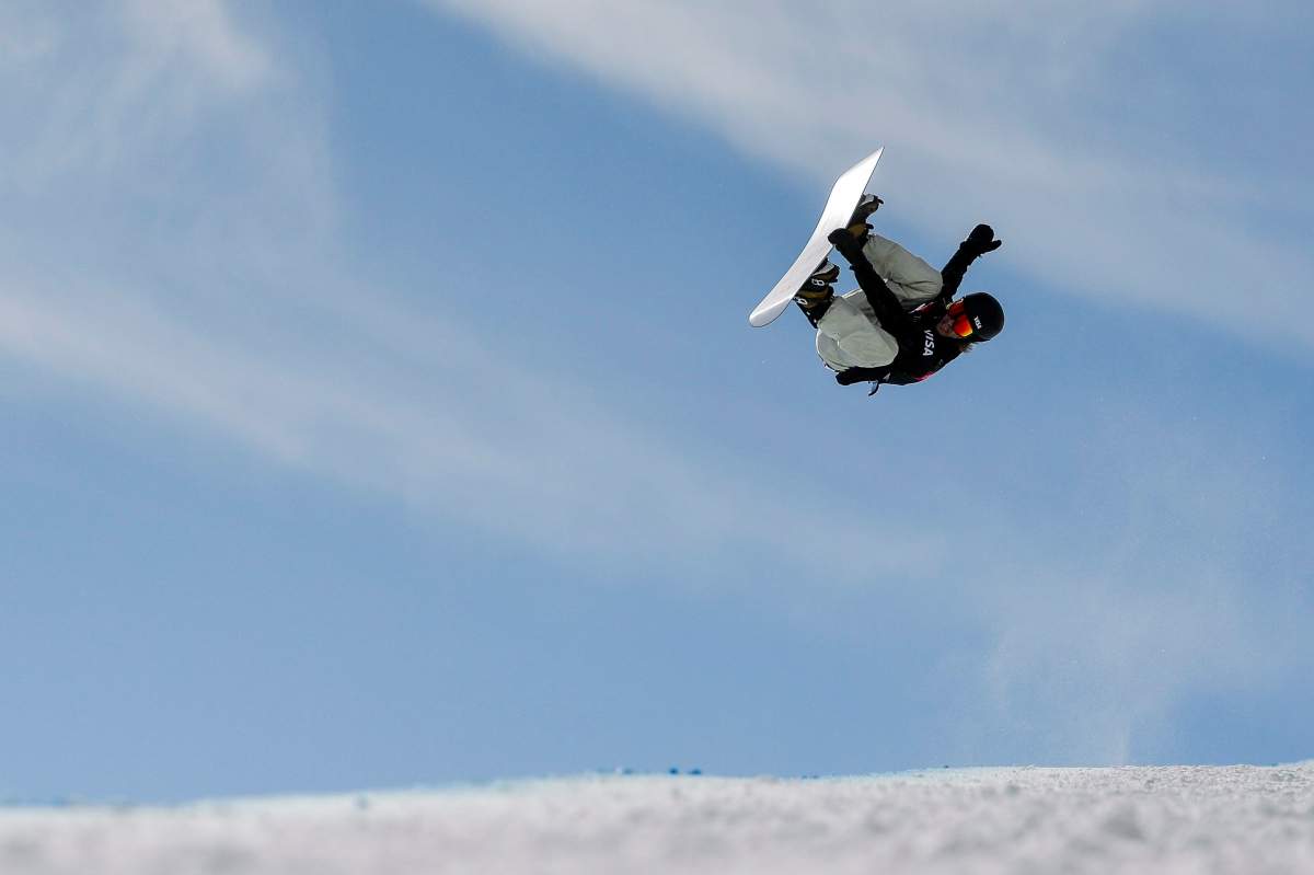 Patrick Burgener, of Switzerland, competes in the men's snowboard halfpipe final at the freestyle ski and snowboard world championships, Friday, Feb. 8, 2019, in Park City, Utah. (AP Photo/Alex Goodlett).