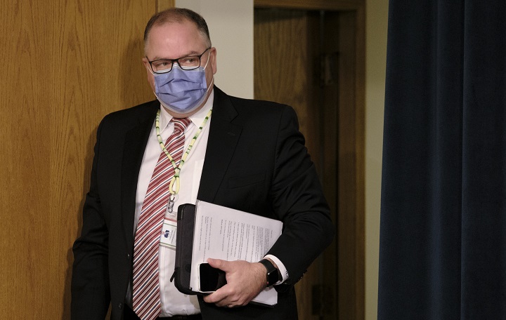 Saskatchewan Health Authority CEO Scott Livingstone arrives to a COVID-19 media update at the Legislative Building in Regina on Wednesday Dec. 9, 2020. 