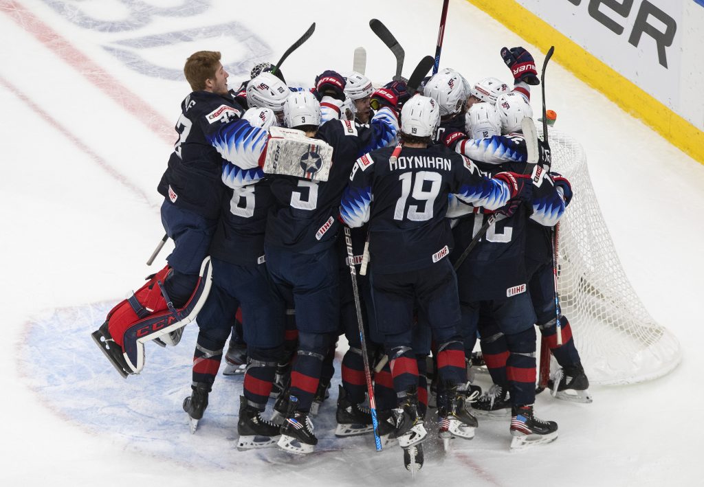United States celebrate their win over Finland during IIHF World Junior Hockey Championship action in Edmonton on Monday, January 4, 2021. THE CANADIAN PRESS/Jason Franson.