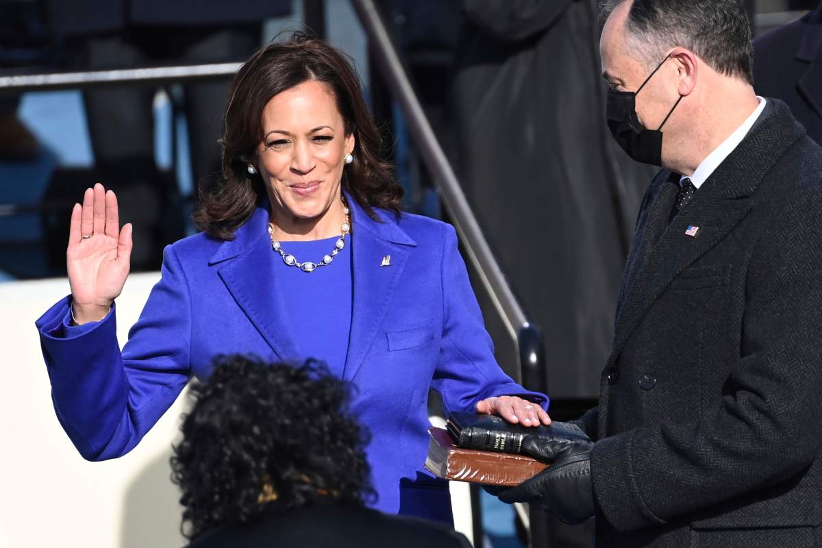 Kamala Harris is sworn in as vice president by Supreme Court Justice Sonia Sotomayor as her husband Doug Emhoff holds the Bible during the 59th Presidential Inauguration at the U.S. Capitol in Washington, Wednesday, Jan. 20, 2021. Saul Loeb/Pool Photo via AP