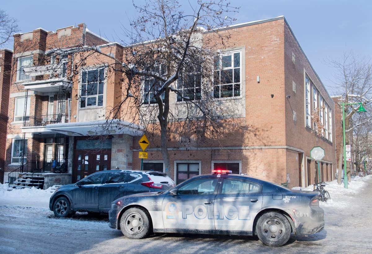A police cruiser is shown outside a synagogue in an Orthodox Jewish neighbourhood in Montreal, Saturday, January 23, 2021, as the COVID-19 pandemic continues in Canada and around the world. Police were called to the synagogue with reports of an illegal gathering. 