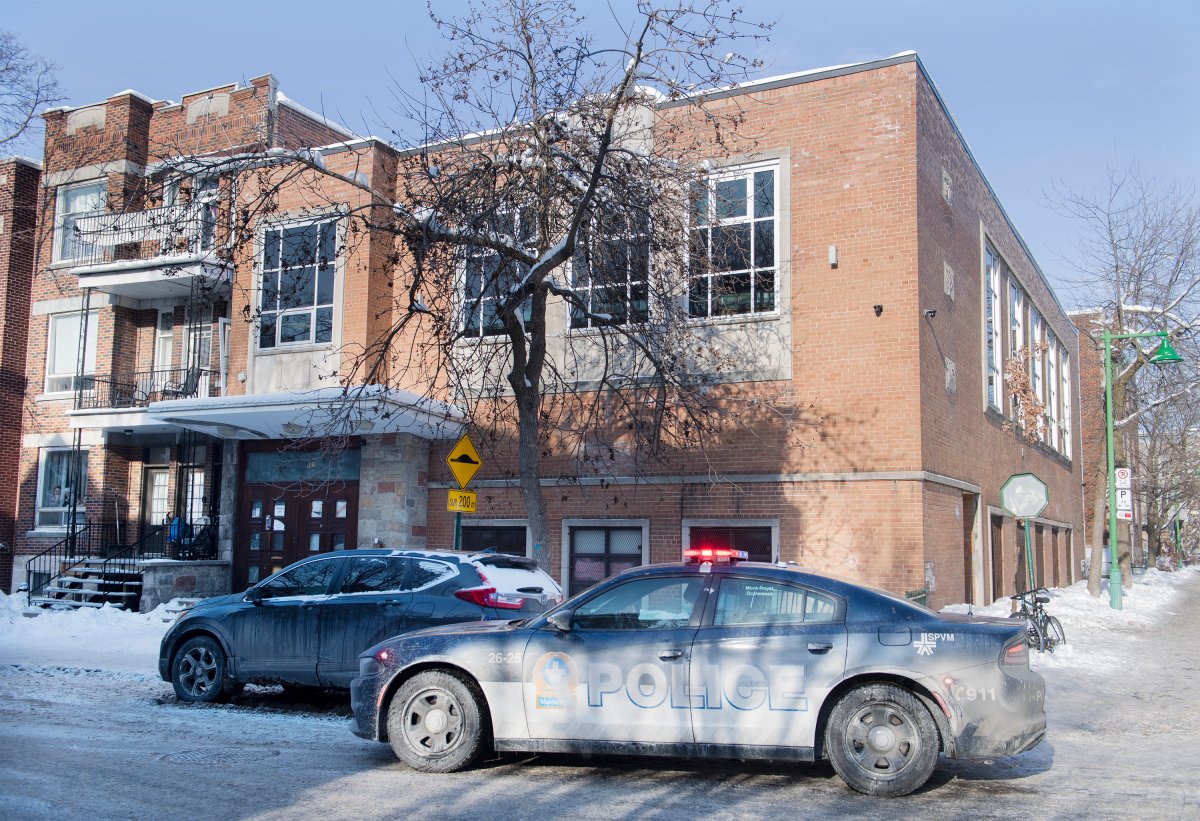 A police cruiser is shown outside a synagogue in an Orthodox Jewish neighbourhood in Montreal, Saturday, January 23, 2021, as the COVID-19 pandemic continues in Canada and around the world. Police were called to the synagogue with reports of an illegal gathering. 