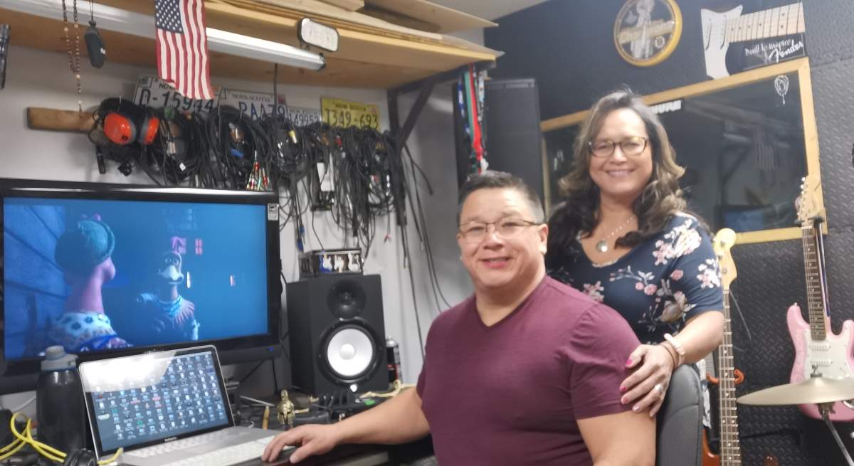 Tom and Carol Anne Johnson are pictured in their home recording studio in Cape Breton, Nova Scotia in a handout photo. Nearly a decade after the two Nova Scotia residents dubbed over a stop motion animated film in Mi’kmaq, people continue to express their interest in the unique version of the adventure comedy. 