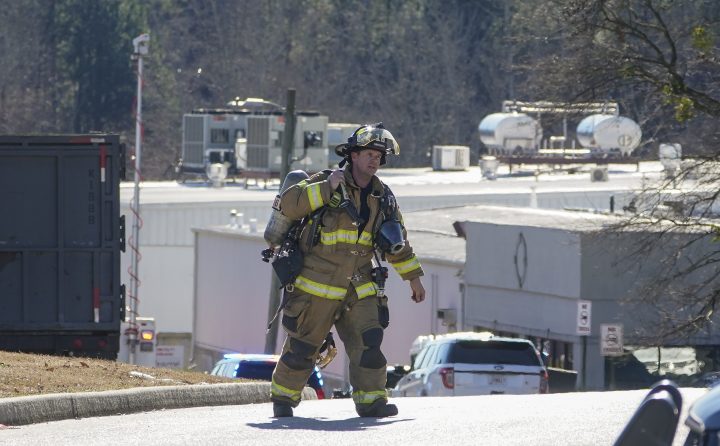 A Hall County firefighter leaves following a liquid nitrogen leak that killed six people at Prime Pak Foods, a poultry plant, on Thursday, Jan. 28, 2021, in Gainesville, Ga. 