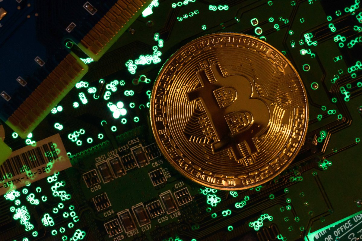 December 6, 2020, Ukraine: In this photo illustration a Bitcoin cryptocurrency commemorative coin seen on circuit board. 