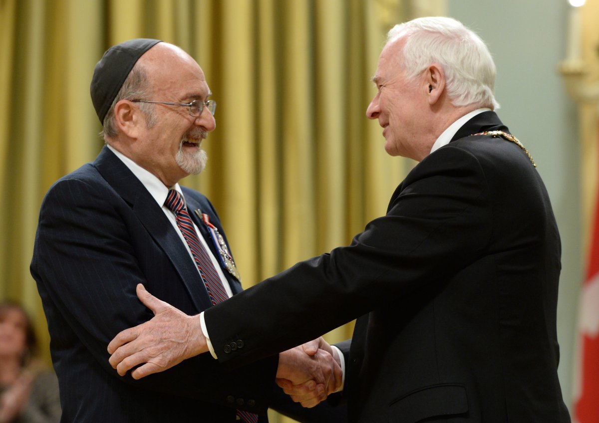 Governor General David Johnston invests Rabbi Reuven Bulka of Ottawa into the Order of Canada to during a ceremony at Rideau Hall in Ottawa on Wednesday, May 7, 2014. 