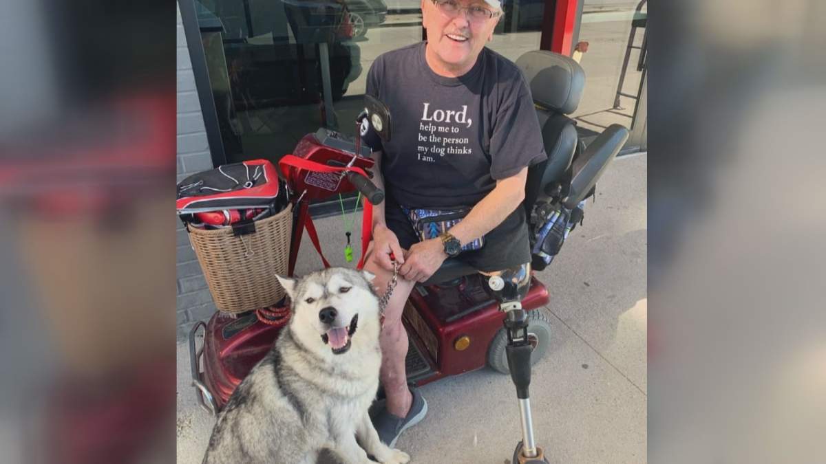 Rick Jowsey and his service dog, Allie.