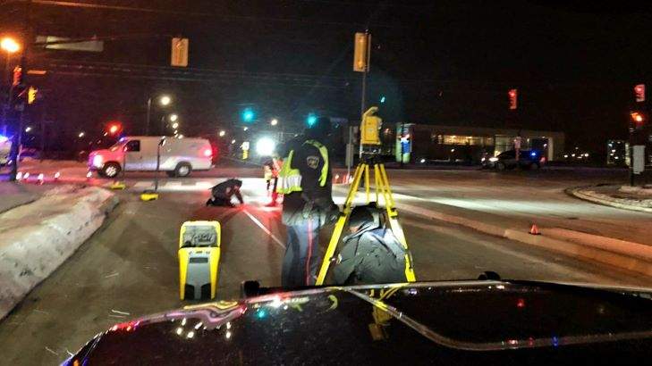 At 7 p.m. Friday, officers say a woman was hit by a vehicle while crossing the street at the intersection of Holland Street West and West Park Avenue.