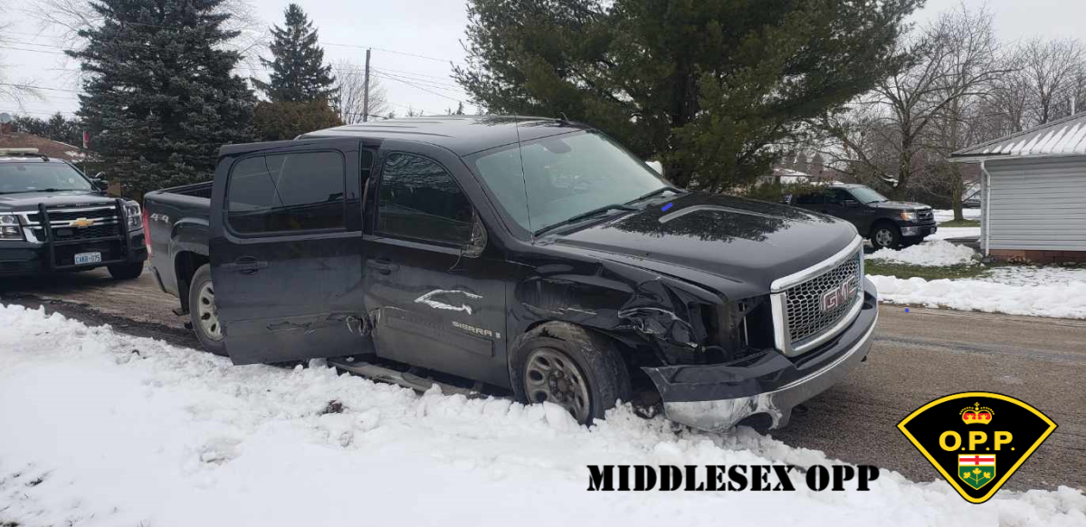 Police say the driver of the truck is facing several charges after leaving the scene of a collision on Hwy. 401 Monday afternoon.