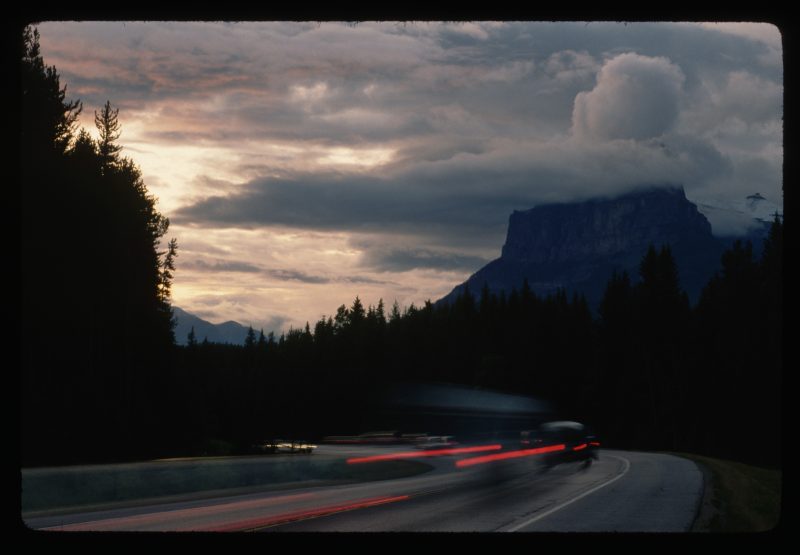 A stock photo showing a portion of the stretch of the Trans-Canada highway between Banff and Castle Mountain.