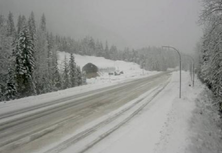 A DriveBC highway camera image showing snowy conditions on the Trans-Canada Highway at Albert Canyon, east of Revelstoke, on Sunday. Environment Canada is telling motorists to prepared for more snow on the high mountain passes Sunday night. 