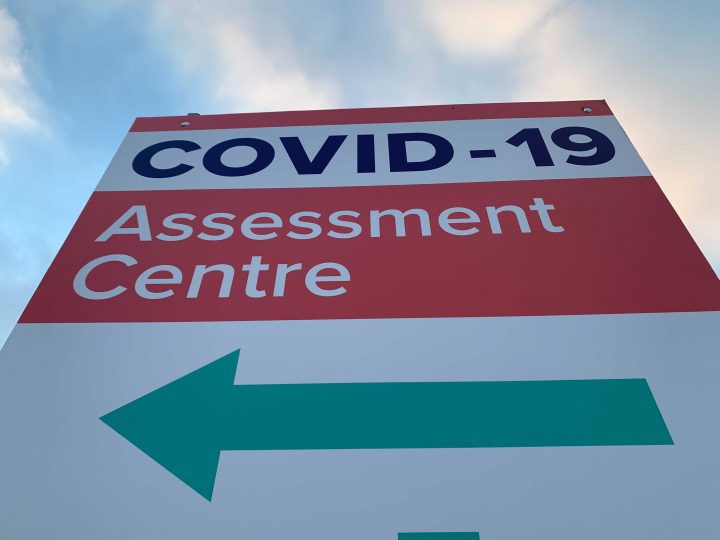 A sign for a COVID-19 assessment centre.