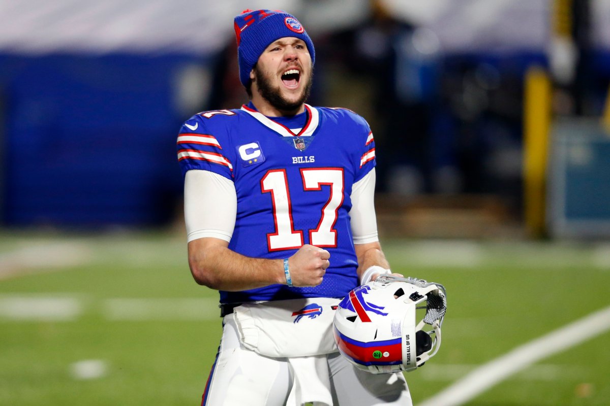 Buffalo Bills quarterback Josh Allen (17) celebrates after an NFL divisional round football game against the Baltimore Ravens Saturday, Jan. 16, 2021, in Orchard Park, N.Y. The Bills won 17-3.