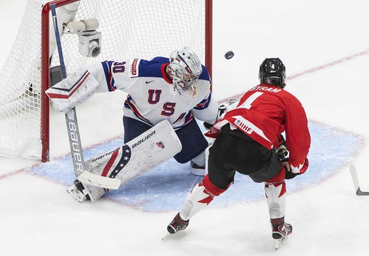 Canada’s Bowen Byram (4) is stopped by United States goalie Spencer Knight (30) during second period IIHF World Junior Hockey Championship gold medal game action in Edmonton on Tuesday, January 5, 2021.