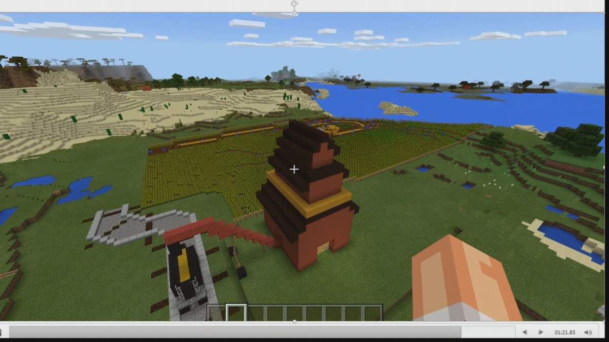 A screenshot shows a Minecraft player at work building a digital world. 