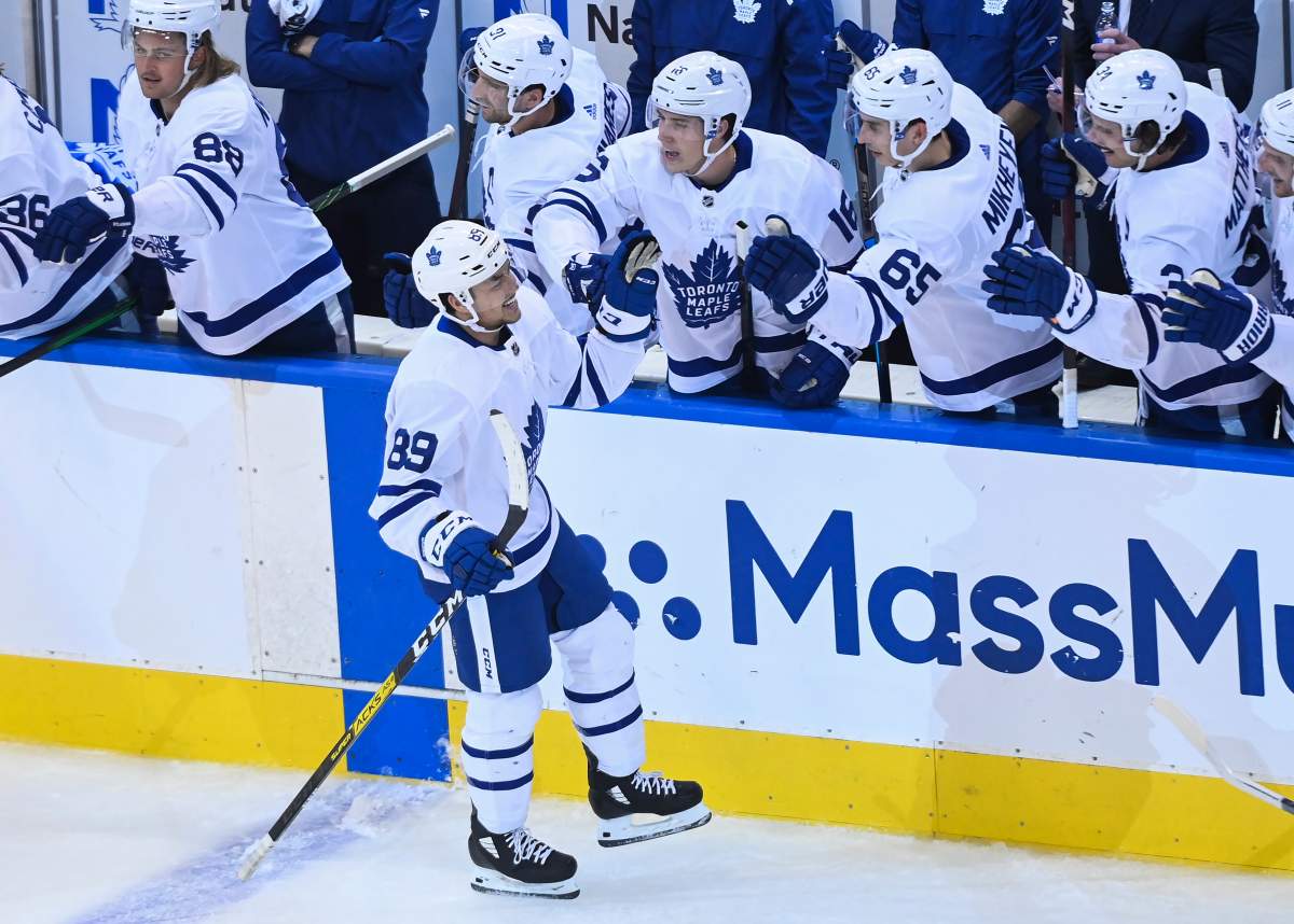 Toronto Maple Leafs left wing Nicholas Robertson (89) celebrates his first NHL goal with teammates during second period NHL Eastern Conference Stanley Cup playoff action against the Columbus Blue Jackets, in Toronto, Thursday, Aug. 6, 2020.
