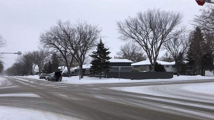 A 74-year-old woman died after being hit by a vehicle at the intersection of McIntosh Street North and Dalgliesh Drive on Wednesday night. 