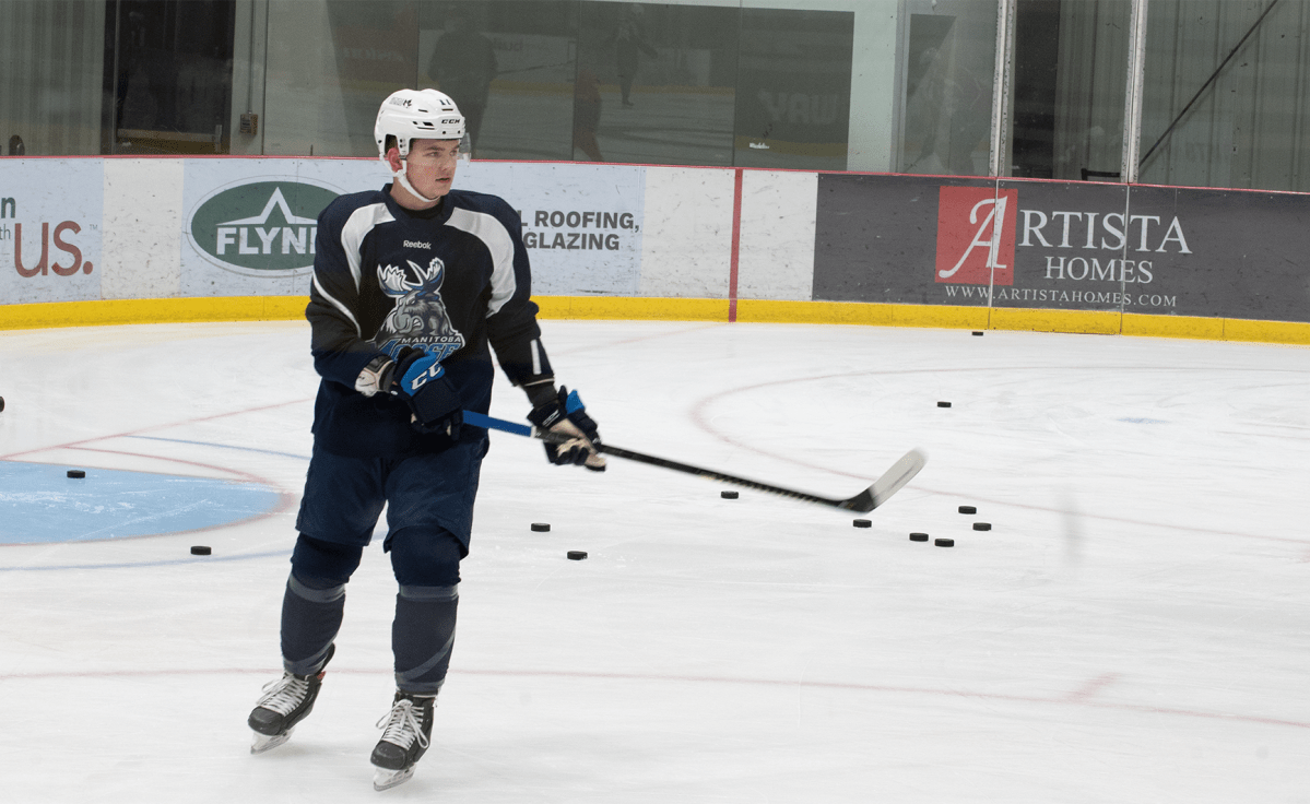 Cole Perfetti skating with 11 other players during day one of the Manitoba Moose 2021 training camp at Bell MTS Iceplex. Photo Credit/Austin Siragusa- Manitoba Moose.