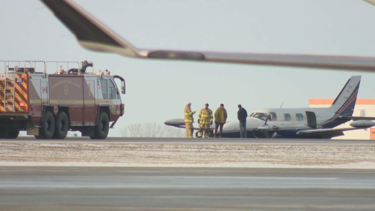 A private Piper aircraft landed on Regina International Airport's main runway without deploying its landing gear on Tuesday morning.