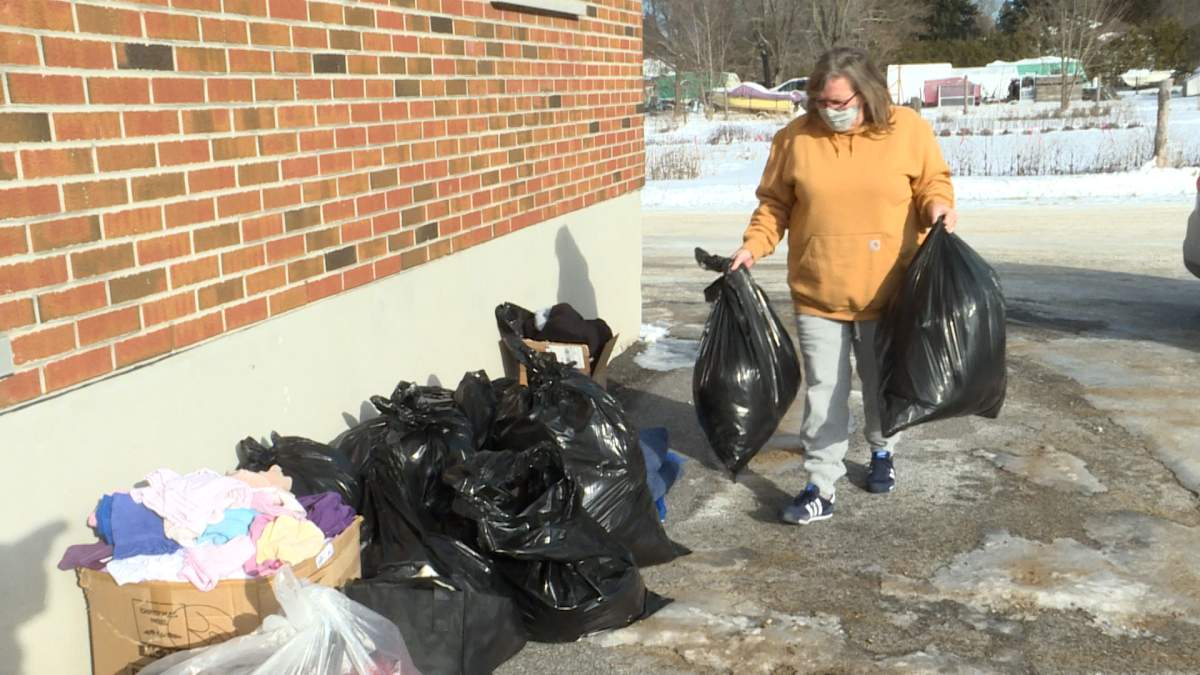 A resident drops off clothing