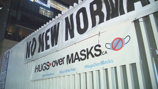 One of the signs at the rally Thursday night. Credit: Global News.