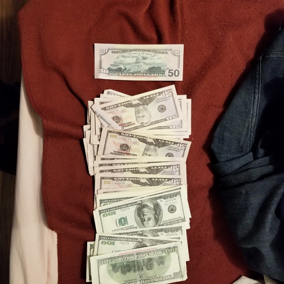 Police photo showing bills allegedly seized from properties linked to Raymond Tetu.