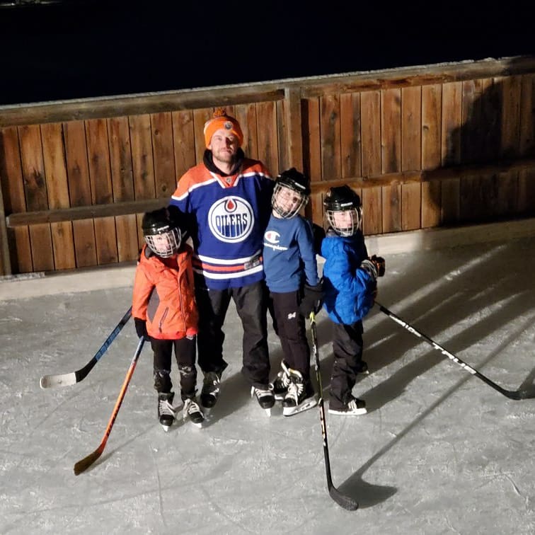 Bentley Minor Hockey Association President Bobby McKinlay and his children