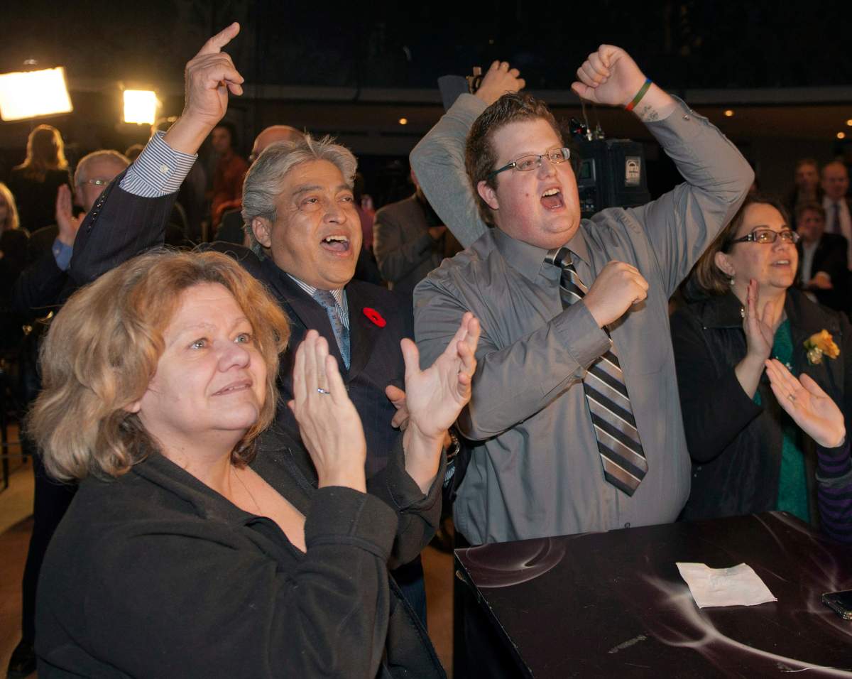 Supporters celebrate  winner of the Montreal mayoral race Sunday, November 3, 2013 in Montreal.