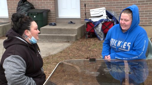 Barbara Marshall sits with friend Kaylee Reid