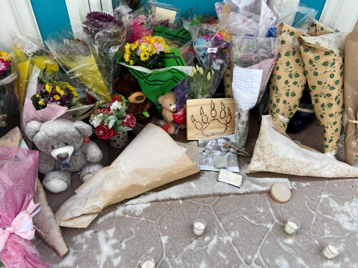 Memorial for Amy Willier outside shop she co-owned.