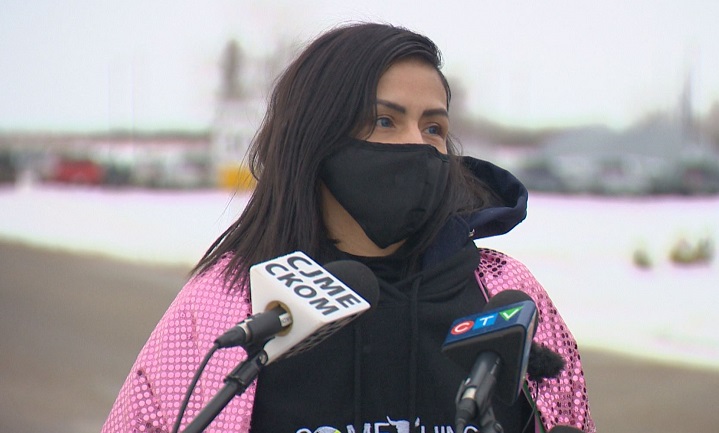 Julie Paul, whose son River Peters is an inmate at the Regina Correctional Centre and tested positive for COVID-19, speaks to the media outside the jail on Jan. 5, 2020. 