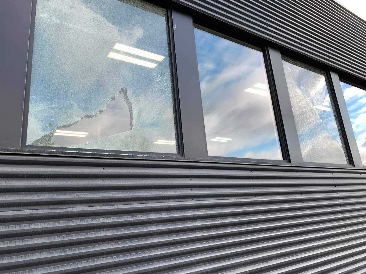 The latest vandalism incident involved three windows above the shop area being smashed.