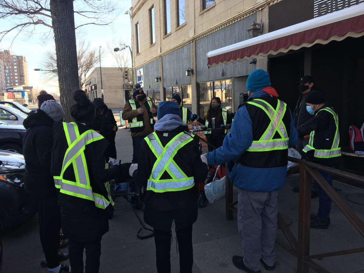 Members of the Sage Clan Patrol in Lethbridge prepare to head out on one of their first foot patrols of the year on Sunday, Jan. 24.