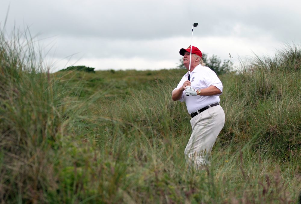 Donald Trump is shown golfing at the Trump International Golf Links Course in Aberdeen, Scotland, in this file photo from July 15, 2012.