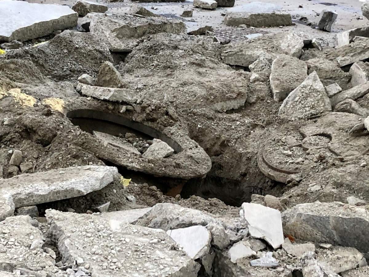 Damage to the concrete sidewalk in downtown Vancouver following an explosion on Jan. 5, 2021. Credit: Sergio Magro / Global News