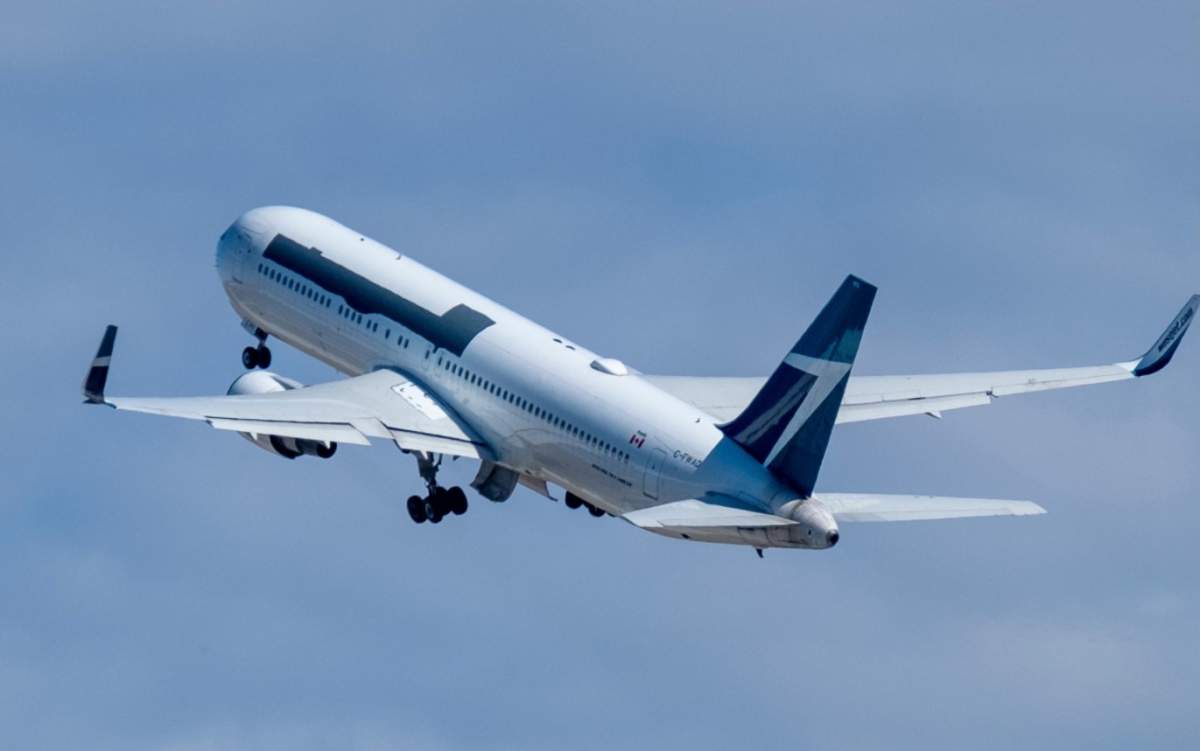 A former WestJet Boeing 767-300 takes off from Calgary’s airport on Sept. 8, 2020 after being bought by Amazon.