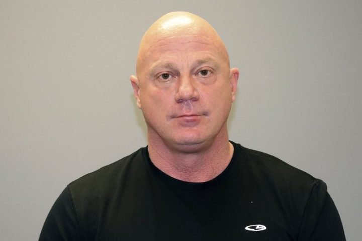 This undated photo provided by the Grapevine Texas Police Department shows, Larry Rendall Brock Jr. During the deadly riot at the U.S. Capitol on Wednesday, Jan. 6, 2021, Brock was photographed on the Senate floor wearing a helmet and heavy vest and carrying zip-tie handcuffs. The retired Air Force officer was arrested in Texas and charged Sunday, Jan. 10 in federal court in the District of Columbia.