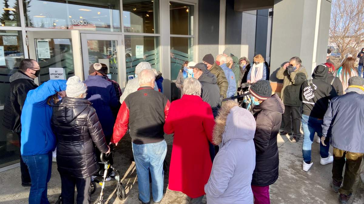 Crowds at the Skyview Power Centre vaccine location in Edmonton on Friday, Feb. 26, 2021.