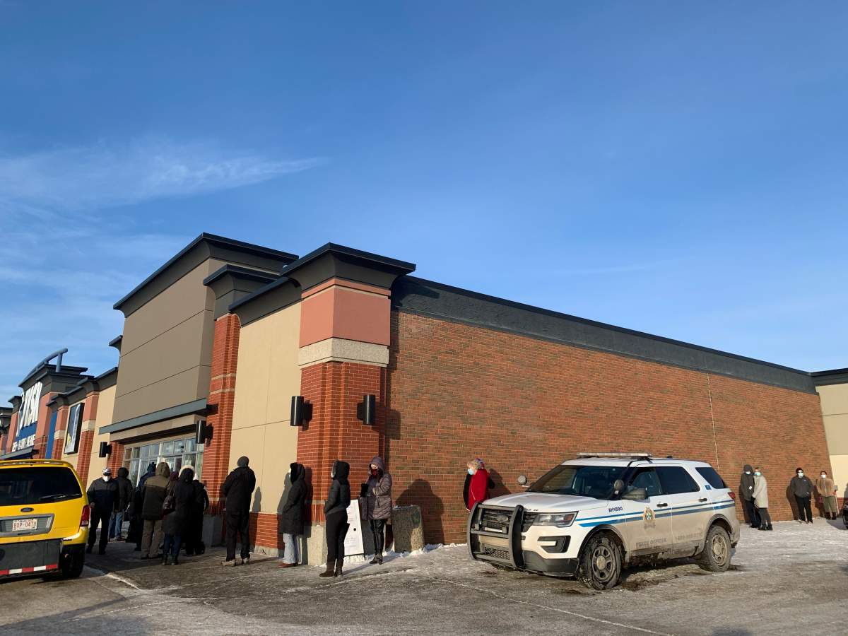 The line of Albertans over 75 and eligible health-care workers on Friday, Feb. 26, 2021 at the South Park vaccination location in south Edmonton.
