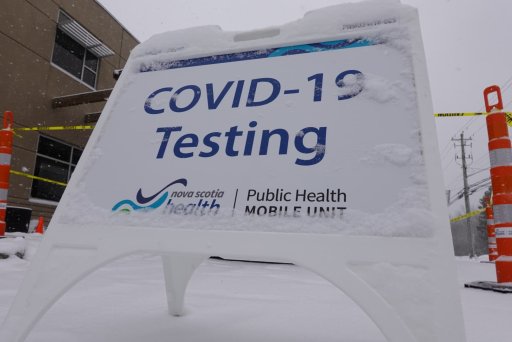 A sign advertises COVID-19 testing at the Kinsac Community Centre in Beaver Bank, N.S., on Feb. 20, 2021.