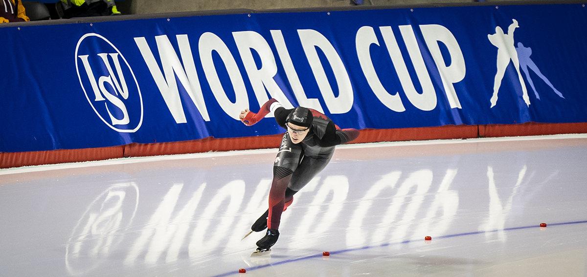 A wideshot showing Abigail McCluskey of Penticton, B.C., rounding through a corner at a World Cup speedskating event in Calgary on Feb. 8, 2020.