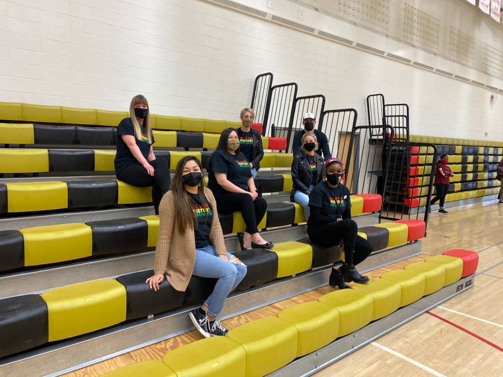 Staff at Chinook High School pose for a photo in their Black History Month t-shirts on Thursday, Feb. 25, 2021.