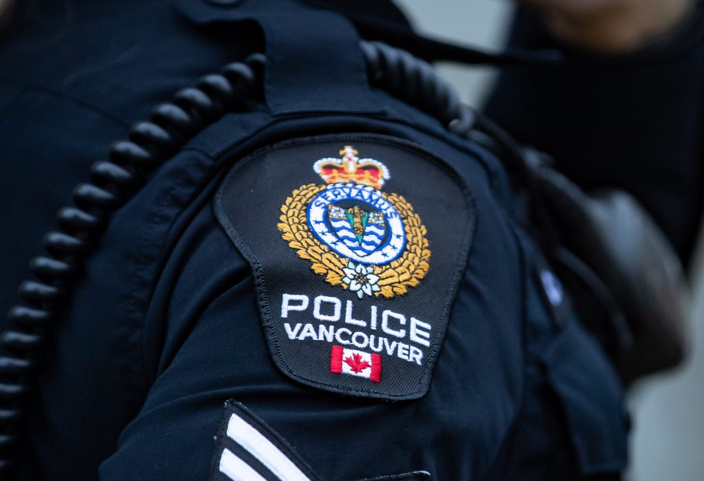 Vancouver police said an officer was also injured Tuesday morning.