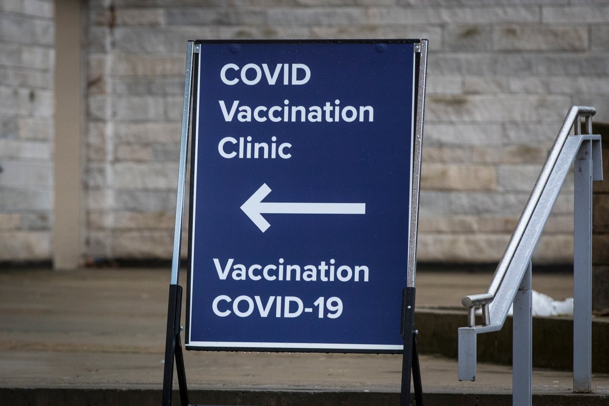 A sign for the COVID-19 vaccination clinic at Kingston General Hospital (KGH) in Kingston, Ont., on Saturday, Jan. 16, 2021.
