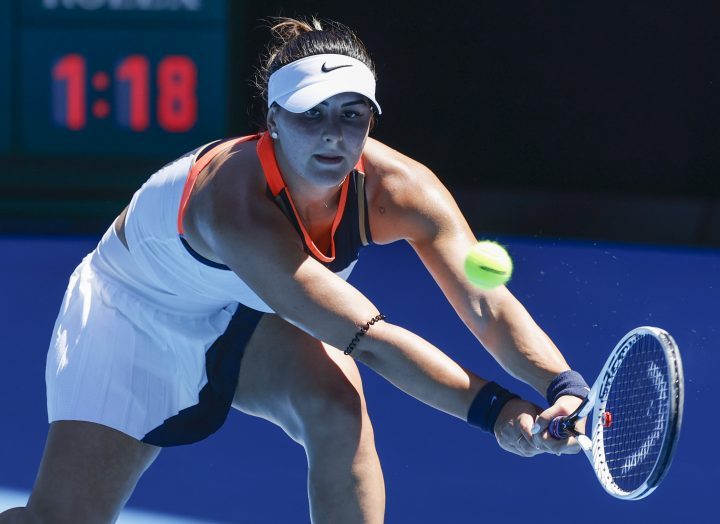 Canada's Bianca Andreescu makes a backhand return during her second round match against Taiwan's Hsieh Su-Wei at the Australian Open tennis championship in Melbourne, Australia, Wednesday, Feb. 10, 2021.