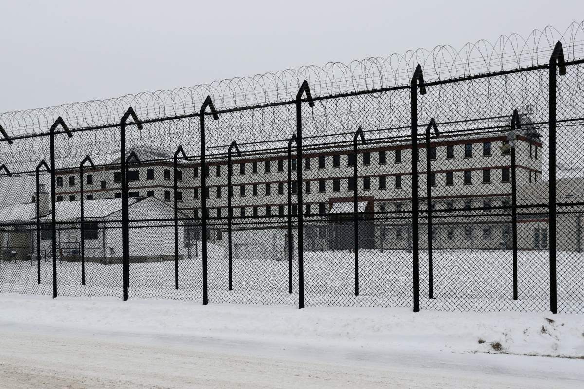 Kingston police say its canine unit helped catch suspects accused of using a drone to drop contraband into Joyceville Institution early Wednesday.